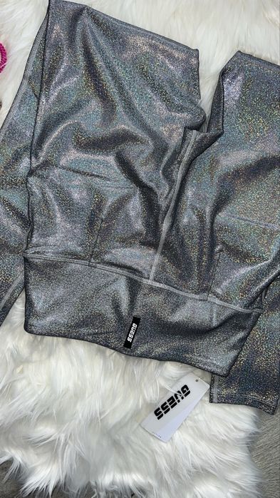 Colanti holografici Guess S si top Levi’s M