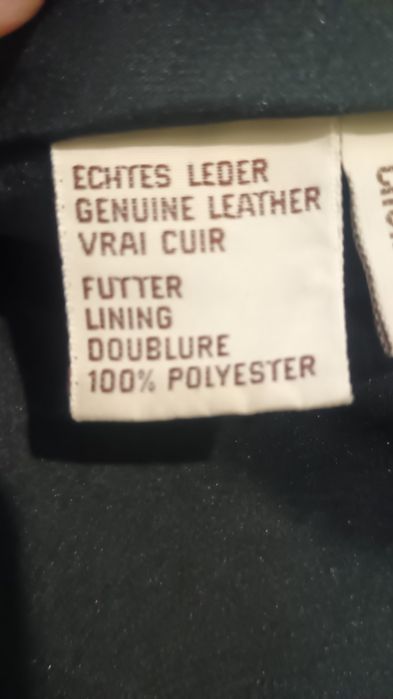 Haina piele,îmbrăcată o data,culoare negru,piele moale,curea din piele atașată,mărime 36, potrivite ta și la 38-40