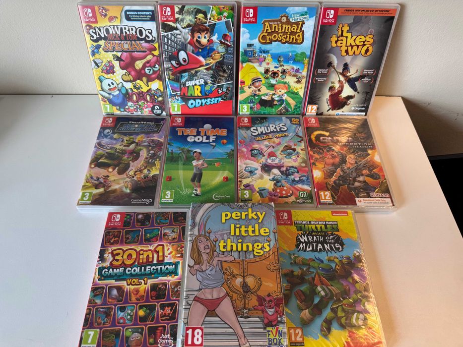 Nintendo Switch OLED + 11 игри + 2 Pro Controller + HORI
