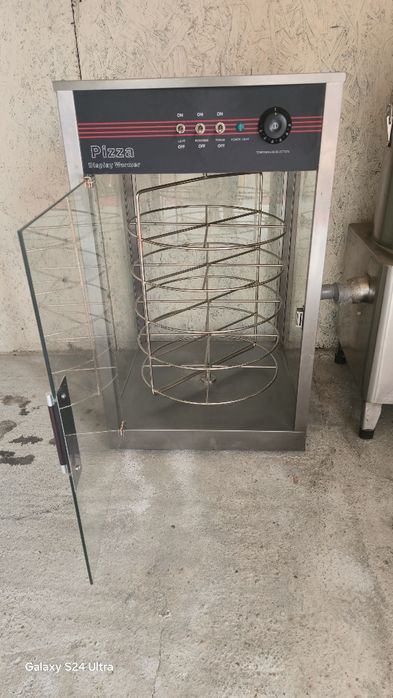 Vand vitrina calda rotativa pentru pizza, senvisuri etc .