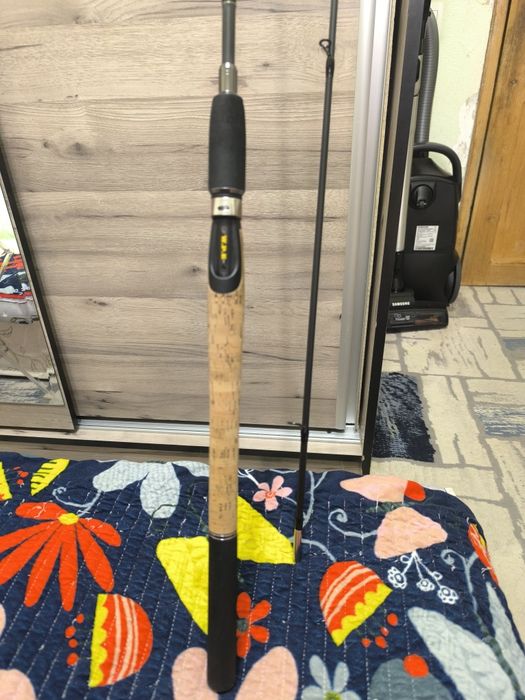 Рыболовный спиннинг фирмы W.P.E