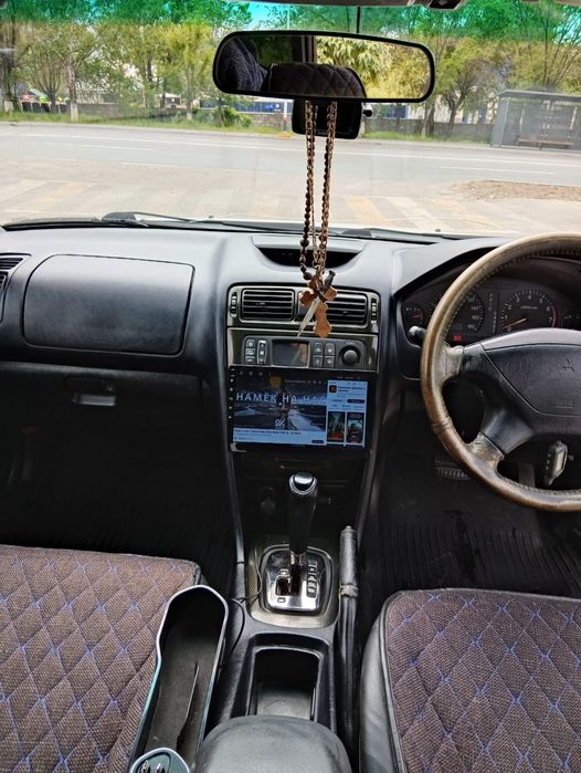 продам машину  Mitsubishi legnum 1998года