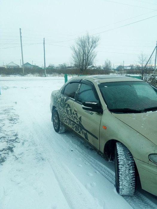 Продам машину Мазда 323 рестайлинг