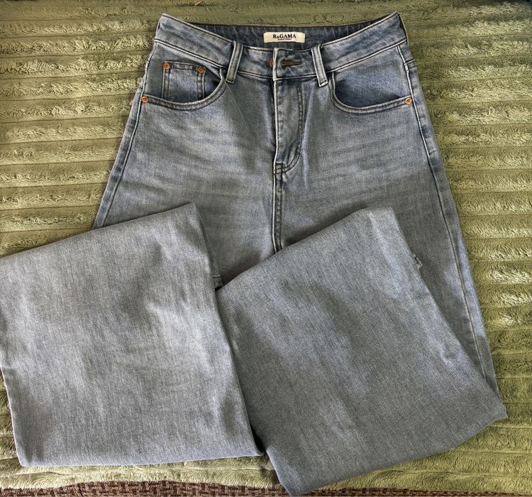 Джинсы трубы голубые