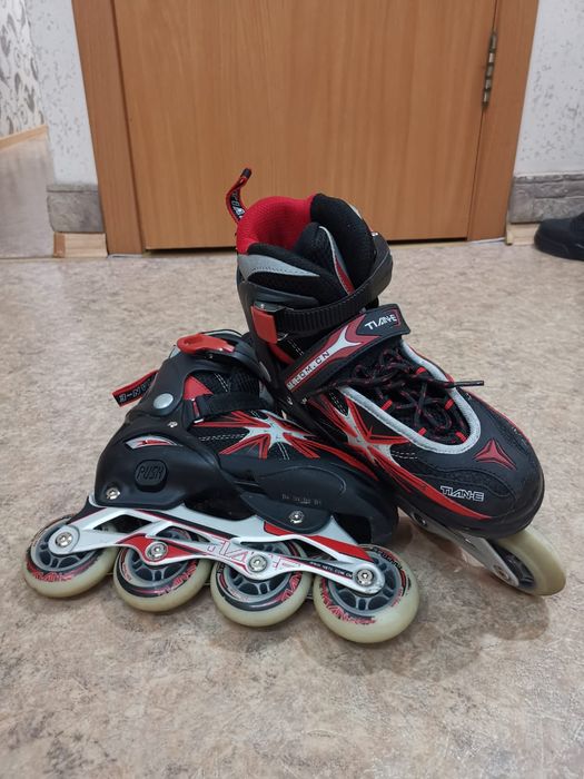 Роликовые коньки