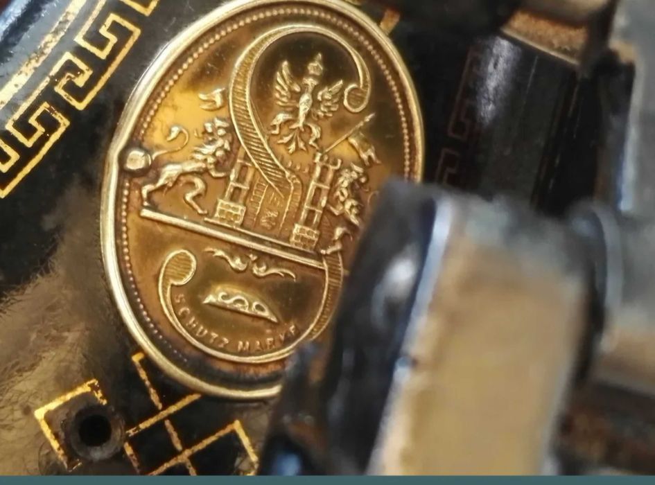 Masina veche de cusut Singer