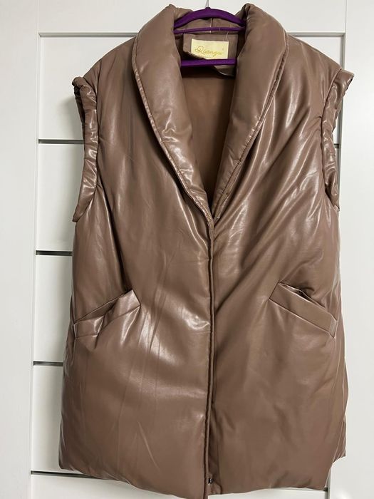 Жилет новый продам