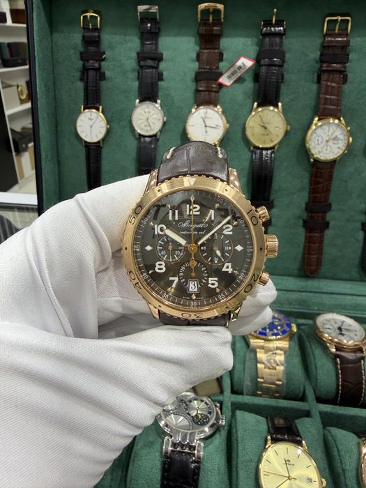 Золотые часыHarry Winston Premier Perpetual Calendar 18k