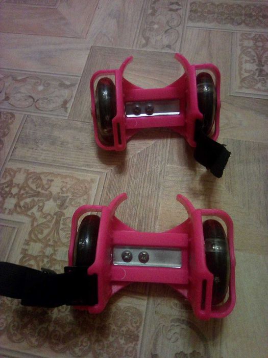 Роликовые коньки