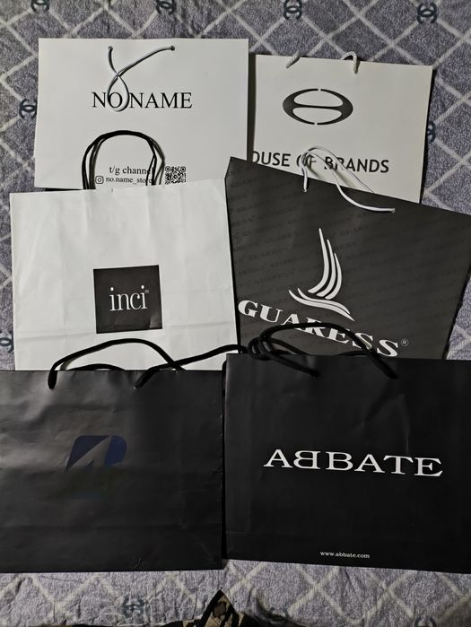 Брендовые и подарочные бумажные пакеты