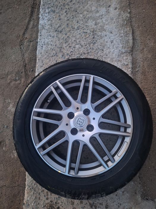 Титановый диск с летней покрышкой