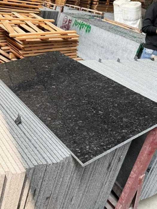 Angola black granit tosh