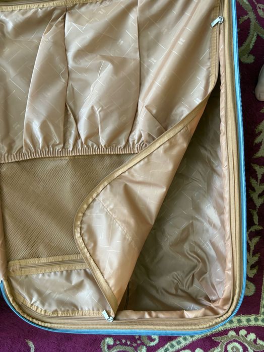 Чемодан на колесах L, объём 135 л.