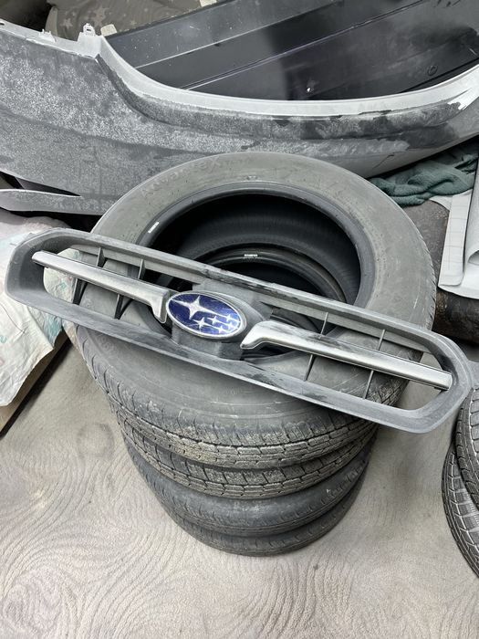 Бампер решетка Subaru BL