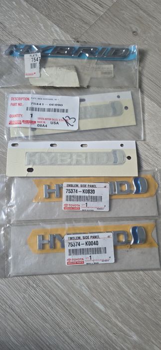 Embleme / Logouri Originale Toyota Hybrid Noi OEM (Haion și Aripi/Laterale)