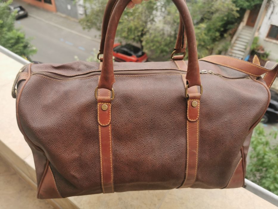 Geanta de voiaj (weekender/duffel) din piele texturată de la brandul Timberland