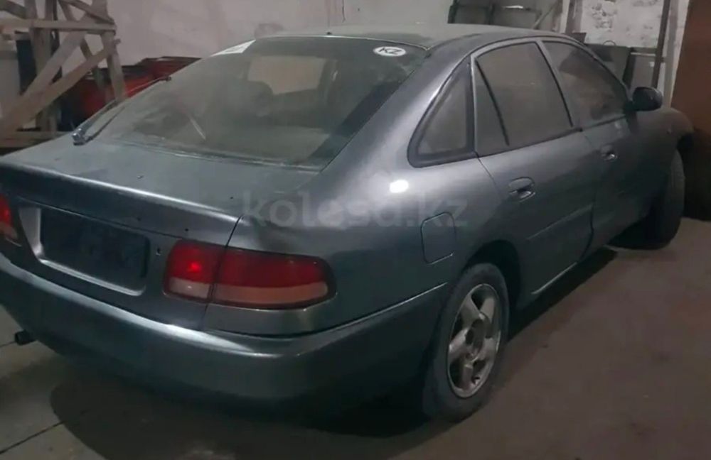 Задний бампер Митсубиси Галант хетчбек