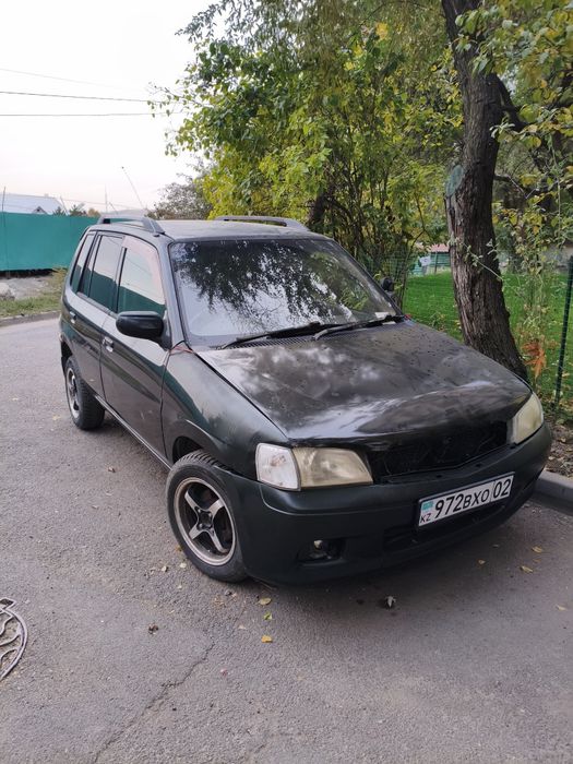 Продам автомобиль Mazda Demio.