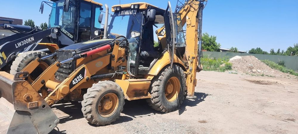 Услуги экскаватора погрузчика 3в1 трактор