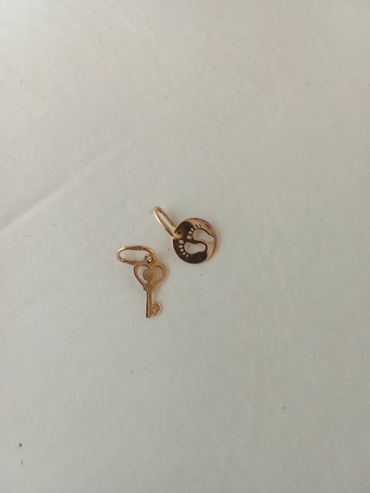 Продам кулон золото