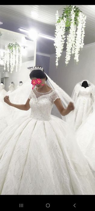 Продаю свадебные платье по цене проката