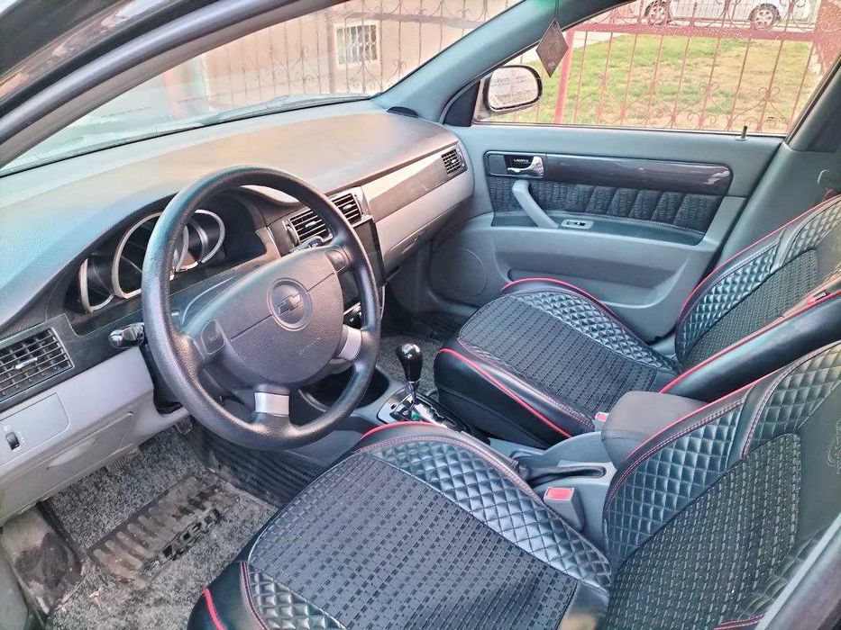 Лачетти 1,8. 3- позиция автомат  2012 год. пробег 144000.