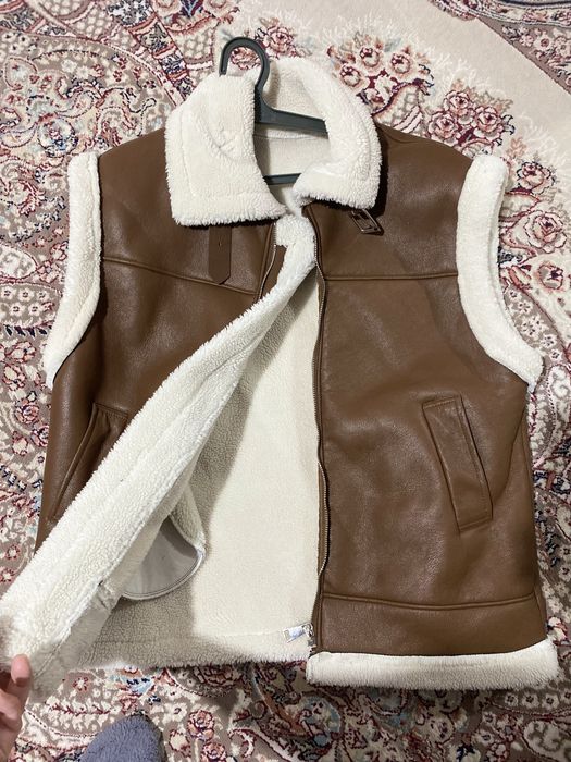 Сырт киімдер киілген