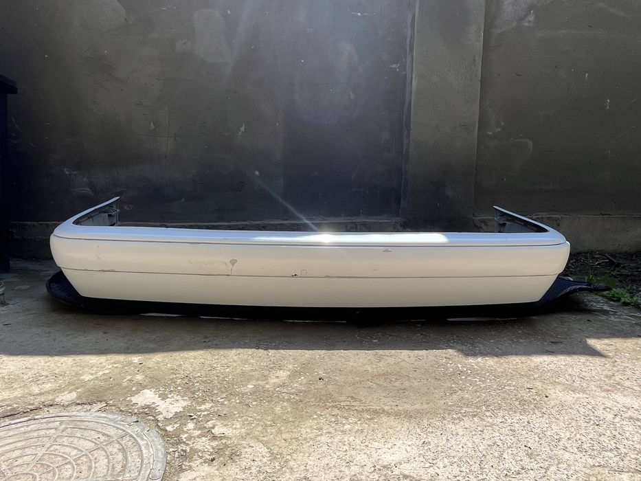 Оригинал бампер 210 до рест