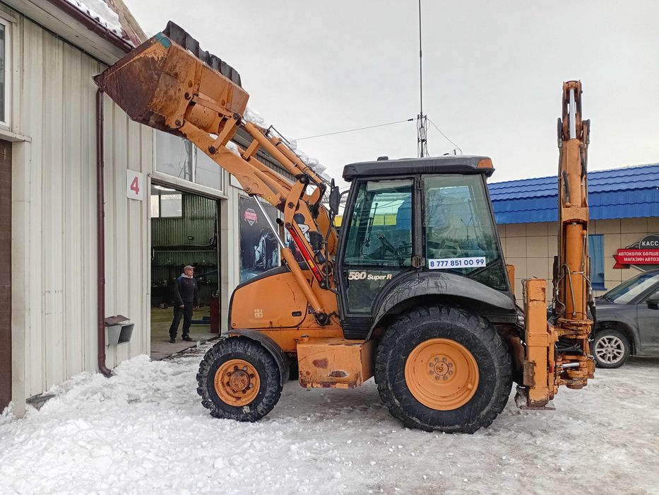 услуги экскаватор погрузчик CASE 580SR,автовышка,16м эвакуатор, ямобур