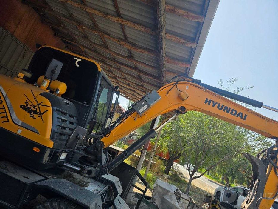 Hyundai HW60 g'ildirakli ekskavator (2017 yil, 360° rotator bilan)