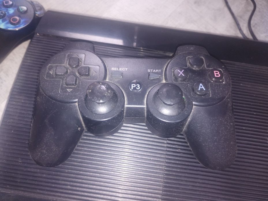 PS 3, o maneta  cu încărcător!