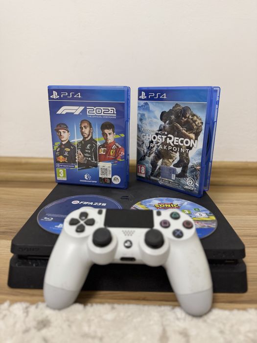PlayStation 4 Slim-500 gb + controller + 4 jocuri