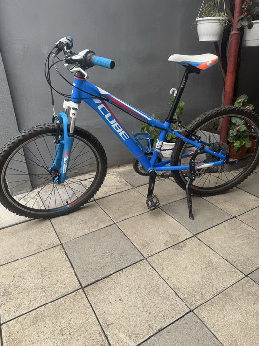 Bicicleta cube copii 7-13 ani