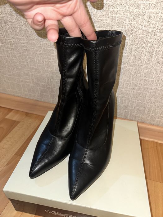 черный ботельион с кзким носом