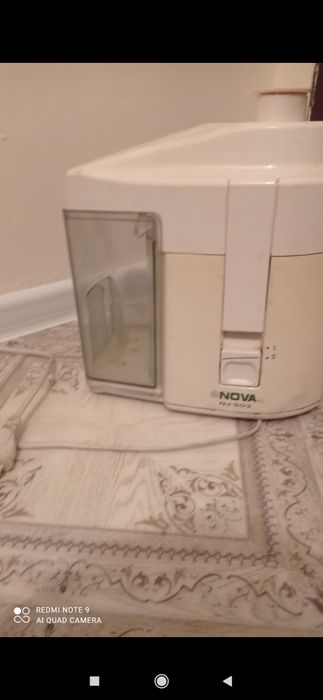 Соковыжималка,рабочая.