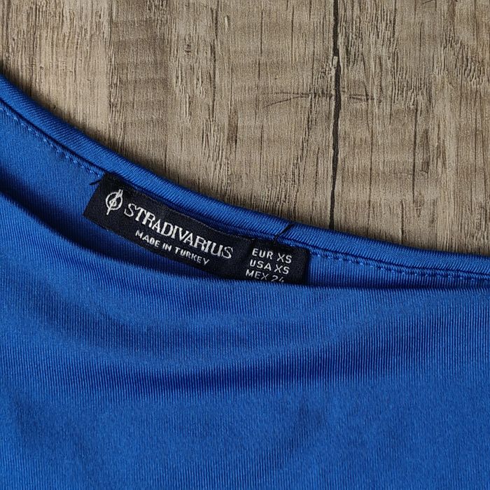 Потници, топове Stradivarius