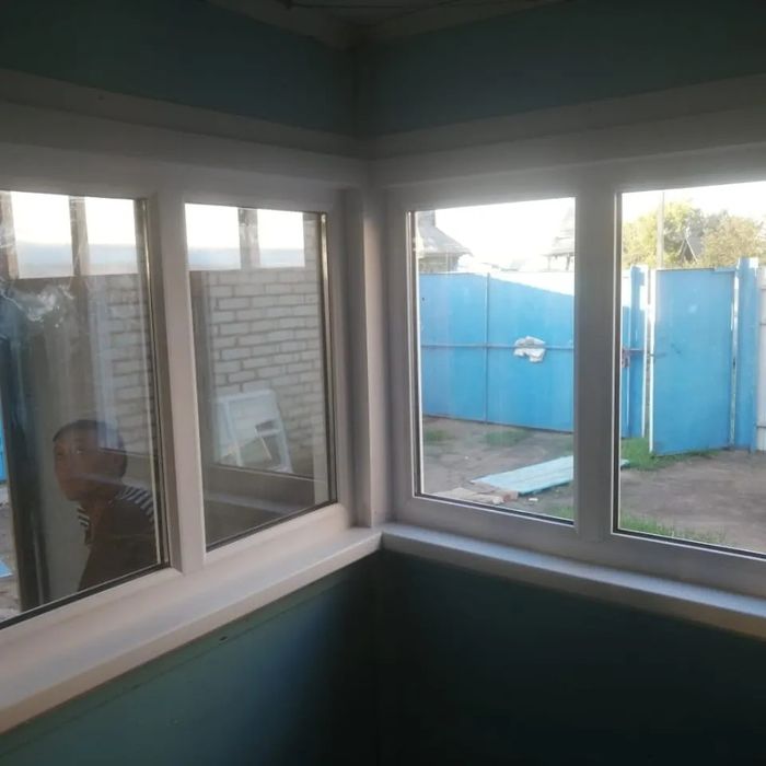 Пластиковые окна Балконы