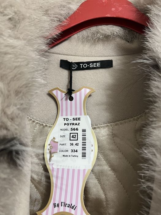 Продается новый пальто