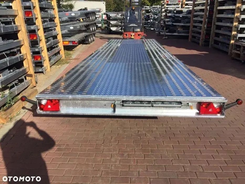 Niewiadow Remorca/Platforma Transport auto 3 axe 8.5m 3500kg Remorca 8.5m/2.1m/3 axe/3500kg/troliu/podea cu tabla de aluminiu