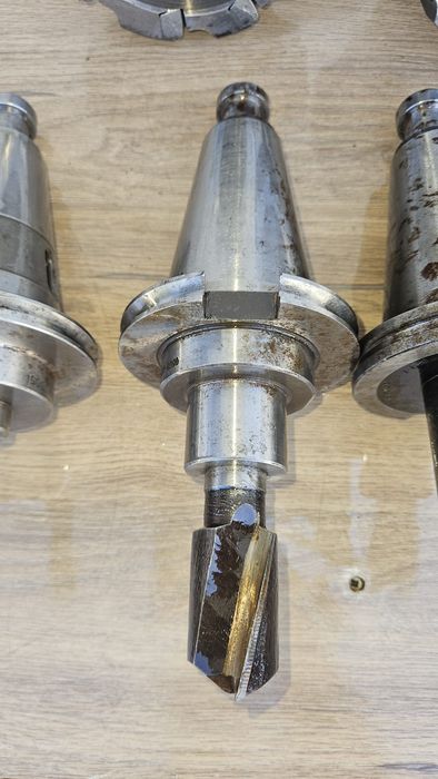 Lot of ISO 50 industrial tooling – arbors, milling heads, and boring head