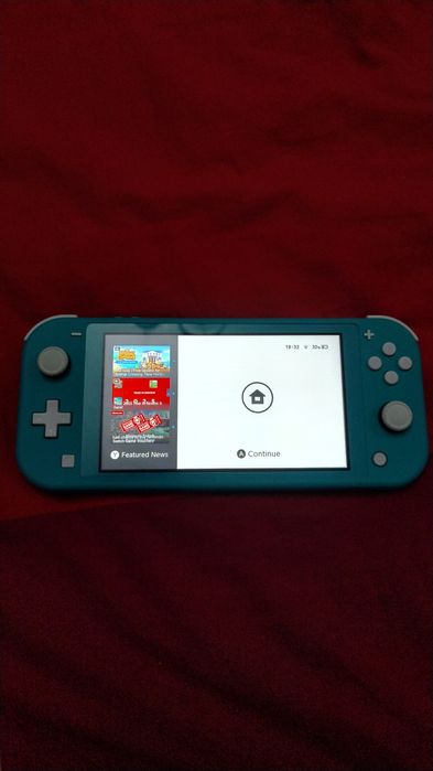 Nintendo Switch Lite – ca nou. Folosit de 3 ori, stare impecabilă.