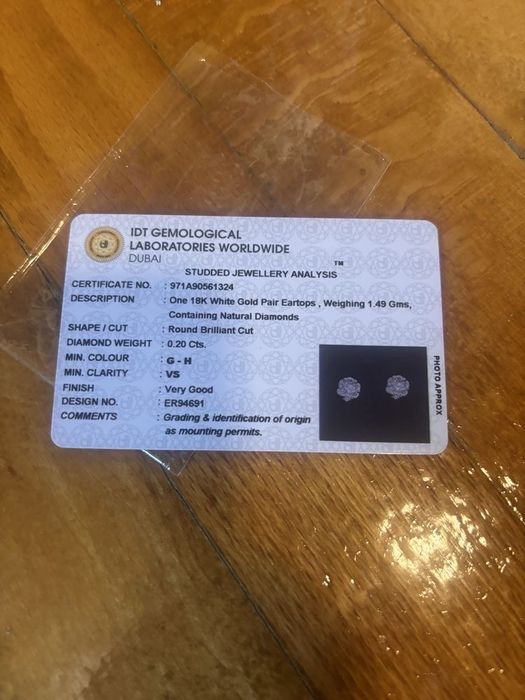 Cercei aur alb di diamante  0.20