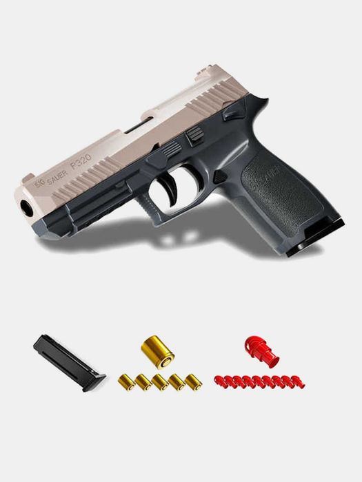 Игрушечный пистолет с вылетающими гильзами