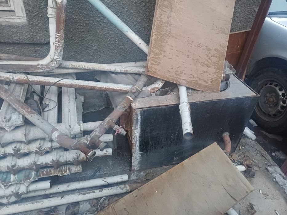 Продам б/у чугунные батареи с печкой