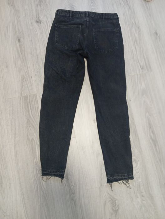 Blugi flared cu fermoar