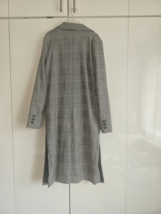 Тънко раирано палто