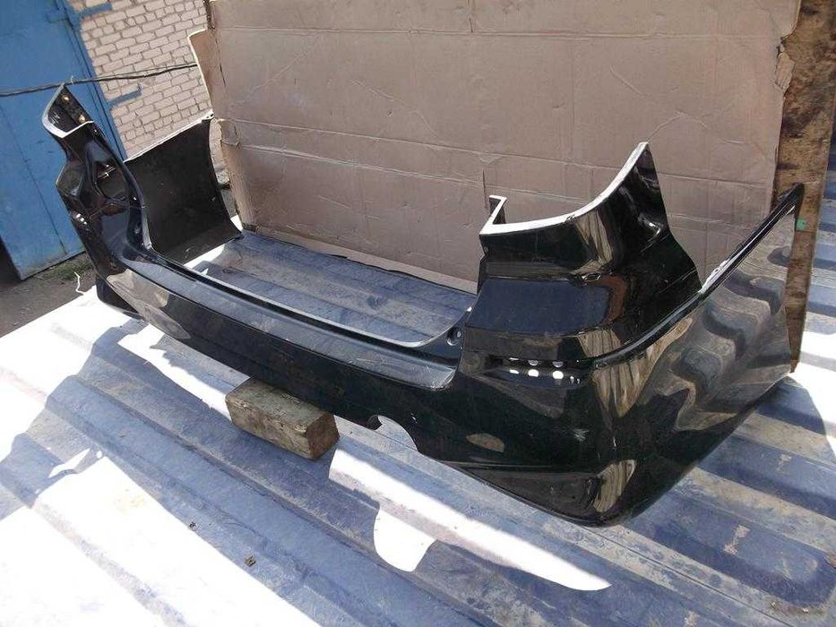 Бампер задний Toyota Alphard I