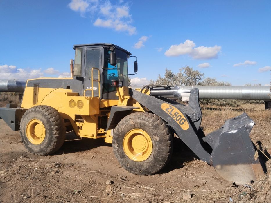 Продам погрузчик ZL50G  3 куба
