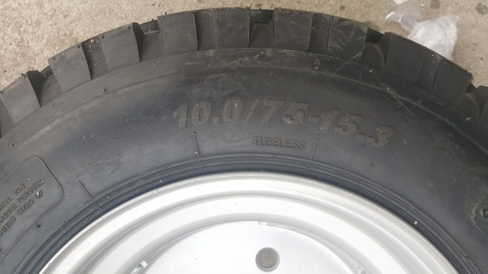 Cauciucuri noi 10.0/75-15.3 echipate pe janta livram in toata tara