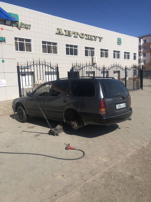 Машина нисан примера р10